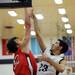 Pioneer High School's Jibreel Spencer's shot is blocked by Bedford High School's  Jackson Lamb during the fourth quarter at Pioneer on Tuesday, Feb. 19, 2013. Melanie Maxwell I AnnArbor.com